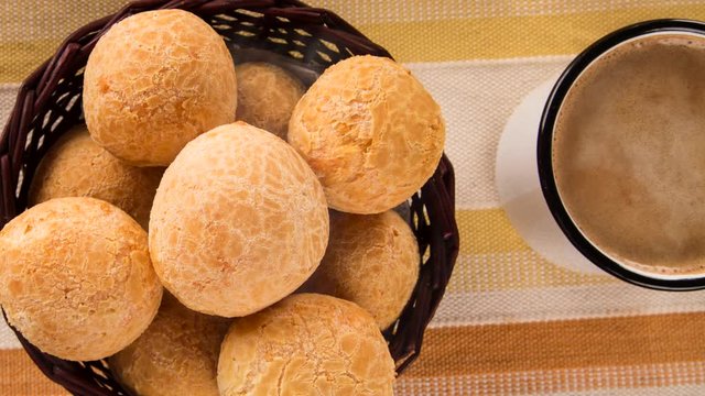 Brazilian cheese buns . Table coffee in the morning with cheese bread. Top view with smoke.