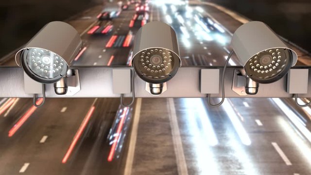 Security cameras are installed above the highway and monitoring the road traffic. CCTV video surveillance is 24/7 to speed metering and violations of the law. Night timelapse with 3d animation, loop.
