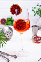 Aperol spritz cocktail with blood orange