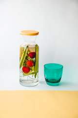 strawberry parsley cucumber mint added to water in a jug for slimming diet