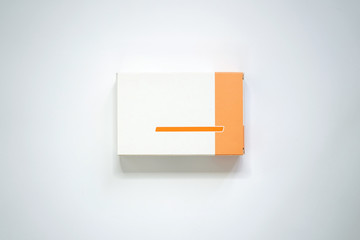 Orange and white medicine packaging carton ideal for mockup