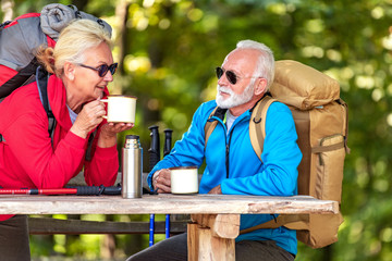 Senior couple hiking in the nature