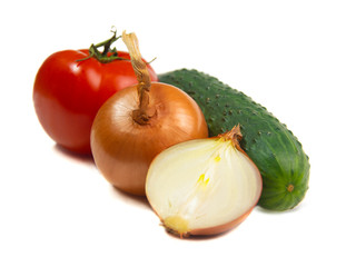 onion tomato and cucumber on a white background