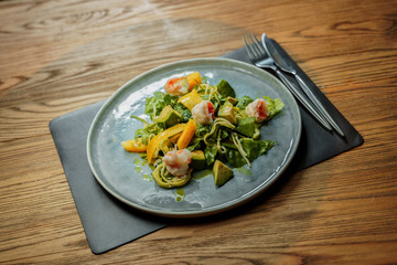 King prawns salad with orange and avocado and herbs
