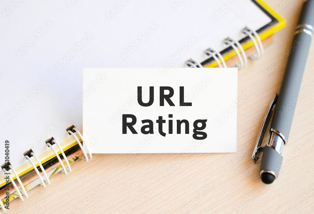 Poster url rating - text on a notebook with a spring and a gray handle