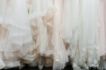 Cloth of wedding dresses made of silk chiffon, tulle and lace. Beautiful White cream bridal dress...