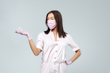 Doctors, infectionist, research and covid19 concept. Satisfied young asian female doctor receive good results on studying virus, discover vaccine, show thumb-up, wear face mask and gloves
