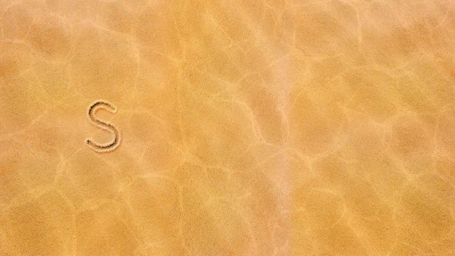 Handwritten animated text in the sand, the day of the week is Saturday.
