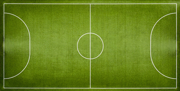 Aerial View Of A Green Football Field At Day Time