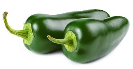 Green jalapeno peppers on white