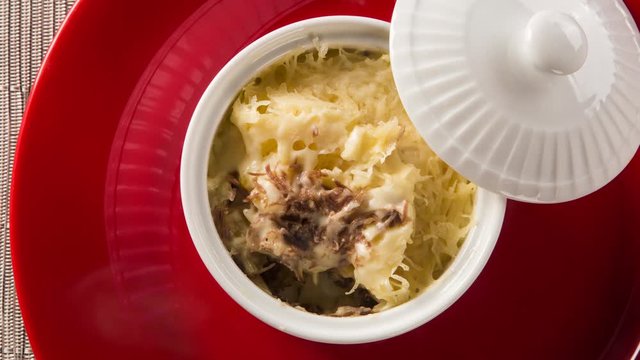 shredded beef jerky and melted cheese with smoke. Top view.