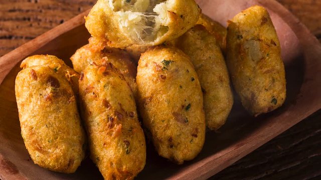 Salt cod fritters. bunuelos de bacalao with smoke. Top view