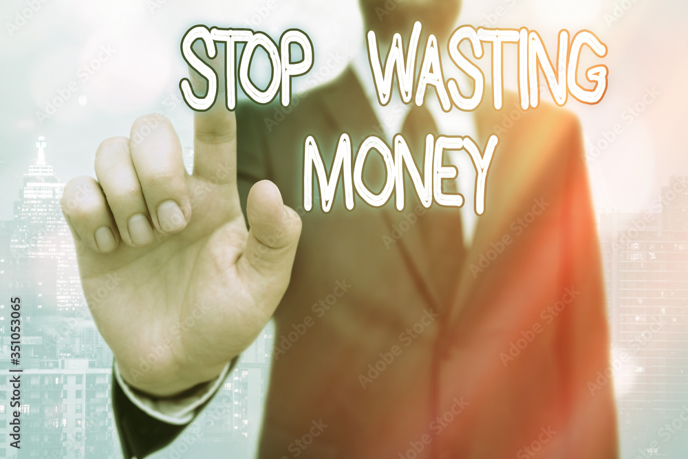 Aufkleber writing note showing stop wasting money. business concept for advicing an individual or group to sta