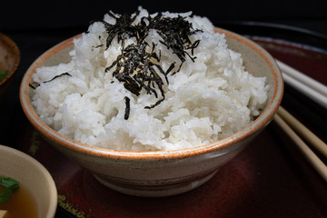 Japanese rice bowl topped with shredded seaweed