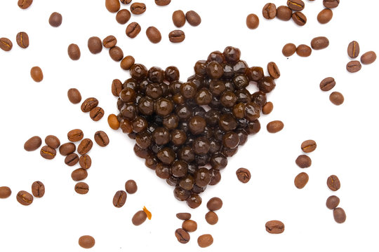 A picture of tapioca ball or pearl tea in heart shape with coffee bean for boba pearl coffee milk