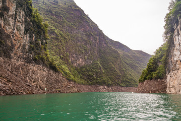 Wushan, Chongqing, China - May 7, 2010: Mini Three Gorges on Daning River. Landscape of wide canyon...