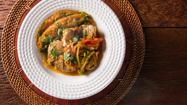 Moqueca capixaba - brazilian fish stew with smoke. Top view.