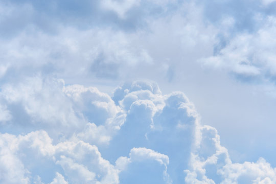 Thick white clouds in the sky at the level of an airplane in flight. © gesrey