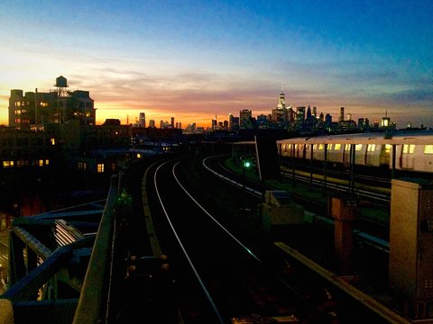 Railroad Tracks In City Against Sky During Sunset © so yee polly yeung/EyeEm