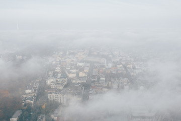 Aerial view of the city in the fog