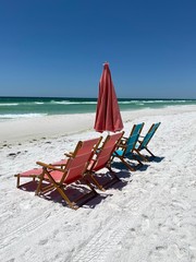 lounge chairs on the beach