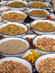 dried fruit and nuts on display in the spice market of chandni chowk in old delhi