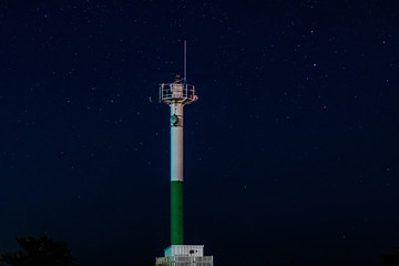 radar tower in the night sky