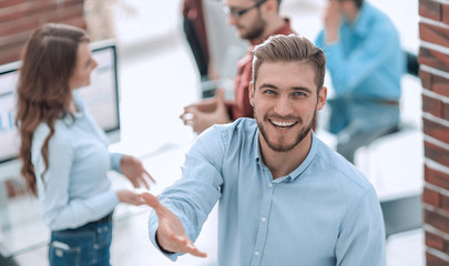 happy young business man portrait in bright modern office indoor