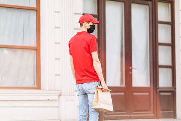 A courier delivers takeaway food. Delivery service