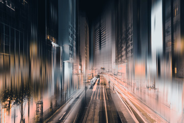 Busy traffic and urban landscape at night in Hong Kong