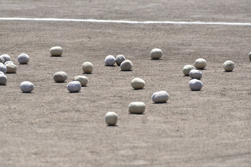 Fototapeta na wymiar White balls on school ground
