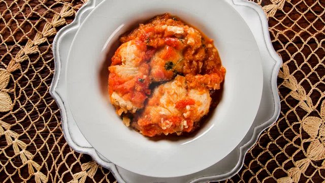 Peixada catarinense - brazilian fish stew with smoke. Top view.