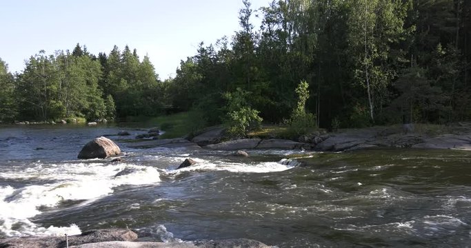 4K Kotka Langinkoski Imperial Fishing Lodge summer day high quality video, green woods, river and bridges in Finland, northern Europe