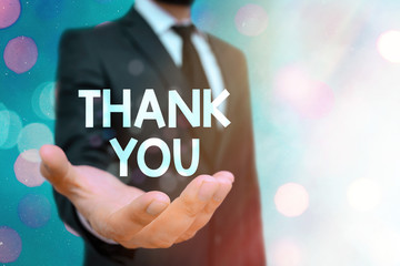 Conceptual hand writing showing Thank You. Concept meaning a polite expression used when...