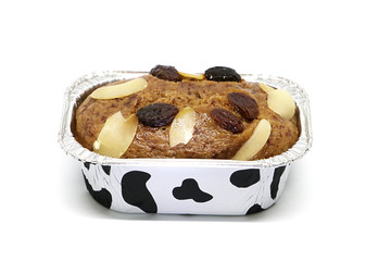 Banana cake with currants and almonds  isolate on white background
