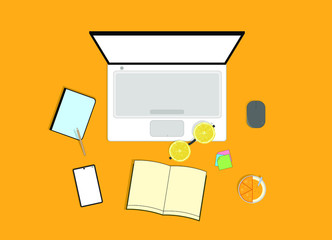 work at home on laptop with notebook, pencil, mouse, book, orange juice, smartphone and sticky notes. home life