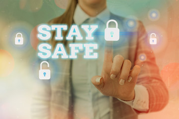 Handwriting text writing Stay Safe. Conceptual photo secure from threat of danger, harm or place to...