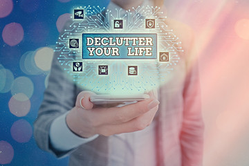 Conceptual hand writing showing Declutter Your Life. Concept meaning To eliminate extraneous things...