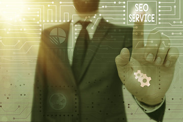 Writing note showing Seo Service. Business concept for techniques and procedures to increase the...