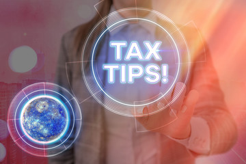 Conceptual hand writing showing Tax Tips. Concept meaning compulsory contribution to state revenue...