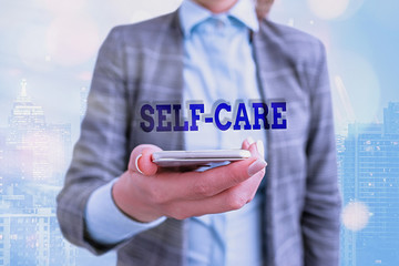 Conceptual hand writing showing Self Care. Concept meaning the practice of taking action to improve...