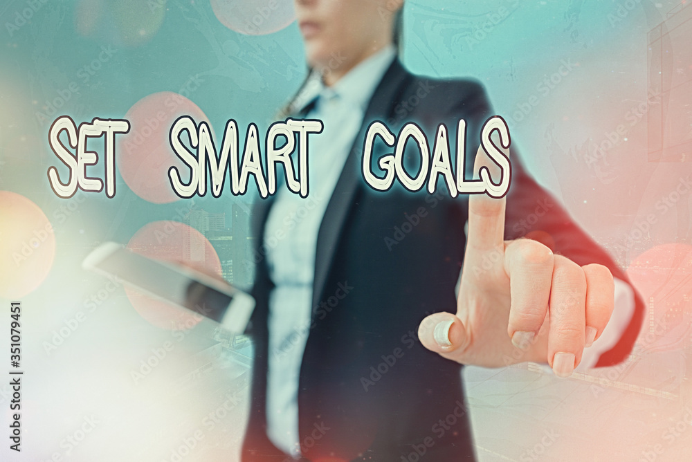 Poster writing note showing set smart goals. business concept for giving criteria to guide in the setting o