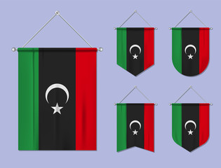 Set of hanging flags Libya with textile texture. Diversity shapes of the national flag country. Vertical template pennant for banner, web, logo, award and festival