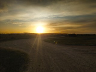 Fototapeta premium zachód słońca na drodze
