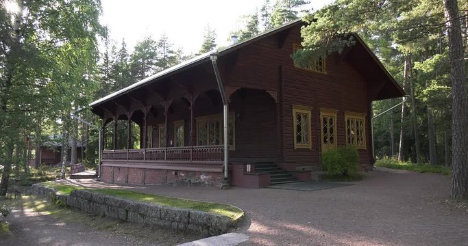 4K Kotka Langinkoski Imperial Fishing Lodge summer day high quality video, green woods, river and bridges in Finland, northern Europe