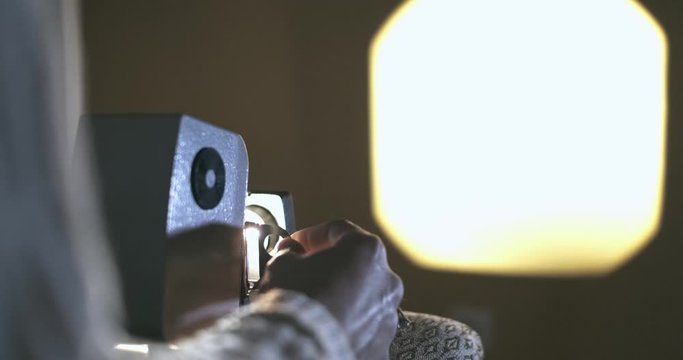 Old Photos Are Projected On Wall From Camera Slides, Projector.