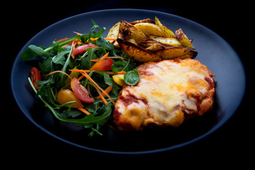 Chicken Parmesan Baked in Tomato Sauce with cheese, chips