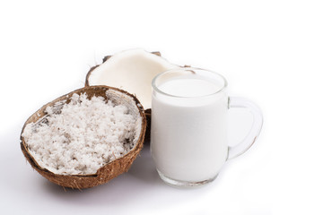Coconut and a glass of coconut milk isolatd on white background. Healthy food.
