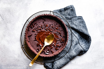 Caramel spread over a chocolate tart crust base.