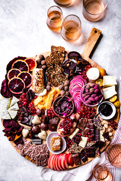 Chocolate, Fruit, Cheese And Crackers On A Platter.